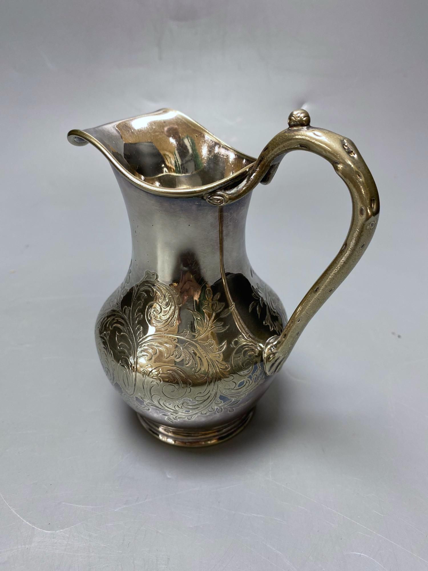 A silver plated cake basket, with cast border, diameter 31cm, two plated trays and three other items